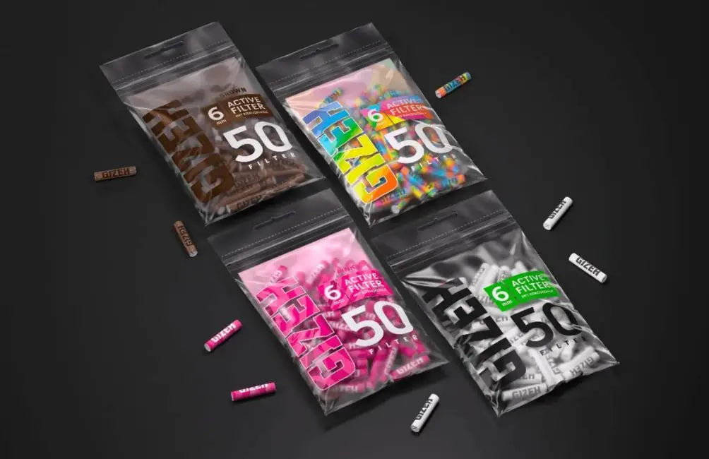 Vier Gizmo 50 Aktivkohlefilter in bunten Designs – Aktivkohlefilter Guide